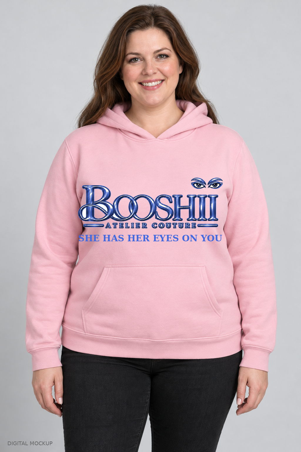 Digital mockup: BOOSHII pink hoodie with royal blue signature and SHE HAS HER EYES ON YOU