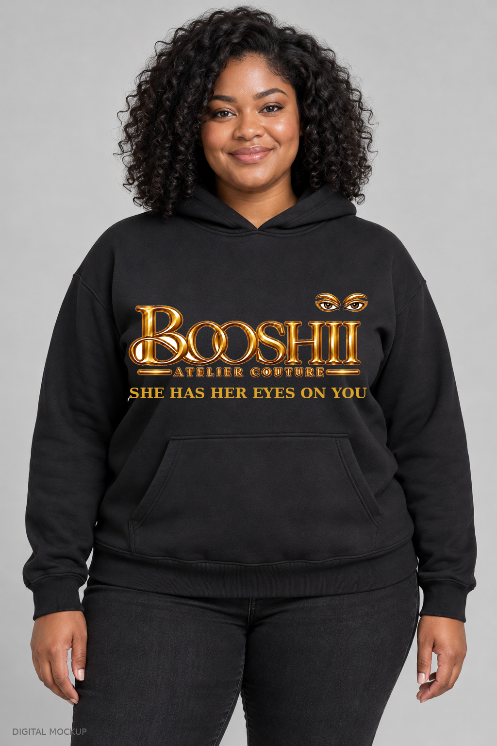 Digital mockup: BOOSHII black hoodie with Gold signature and SHE HAS HER EYES ON YOU