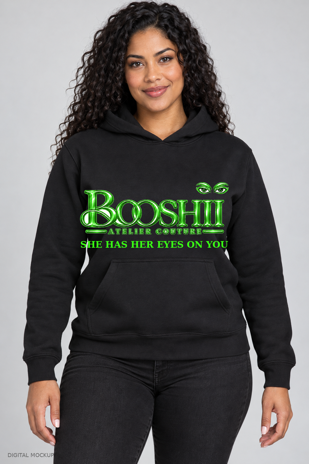 Digital mockup: BOOSHII black hoodie with Neon Green signature and SHE HAS HER EYES ON YOU