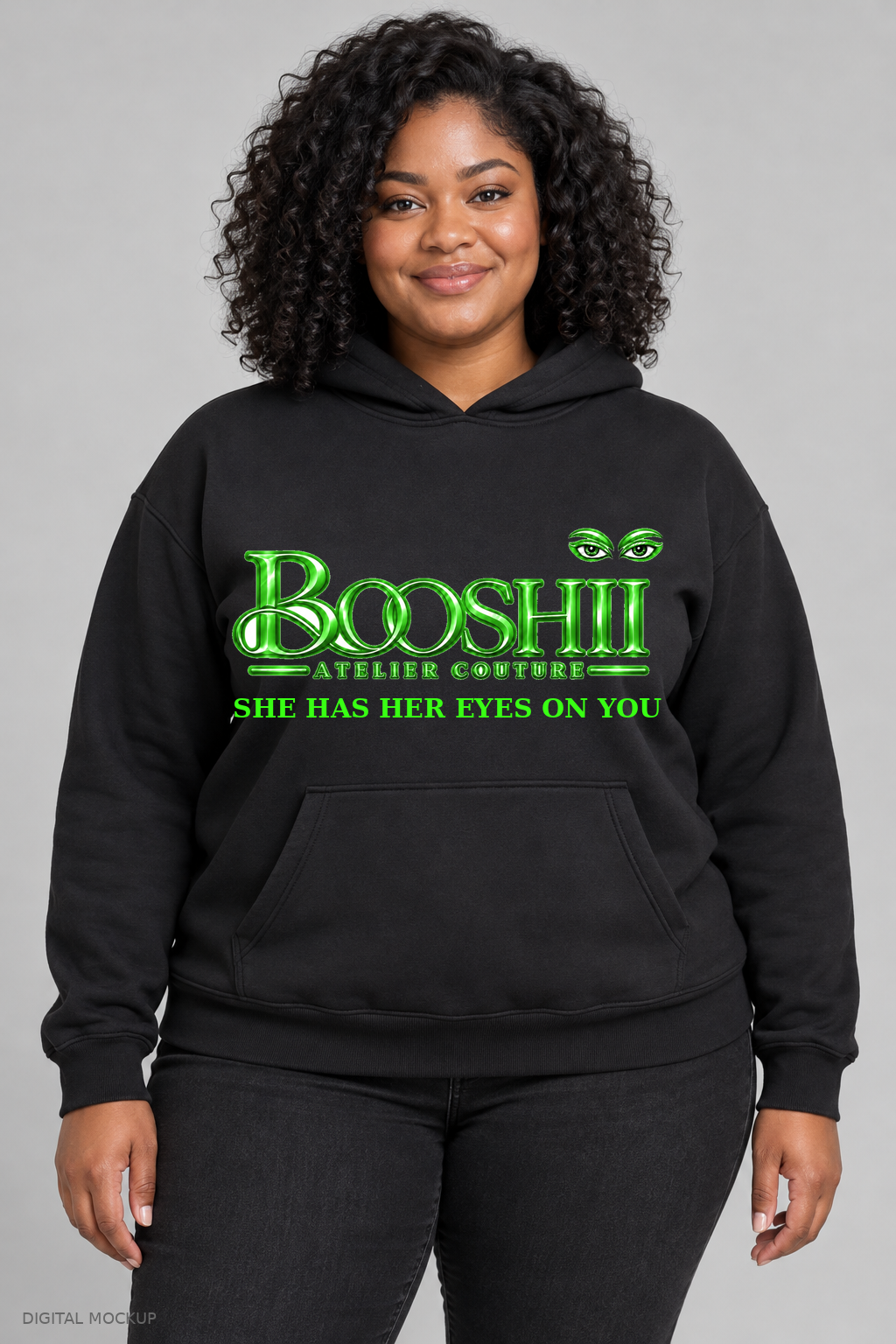 Digital mockup: BOOSHII black hoodie with Neon Green signature and SHE HAS HER EYES ON YOU